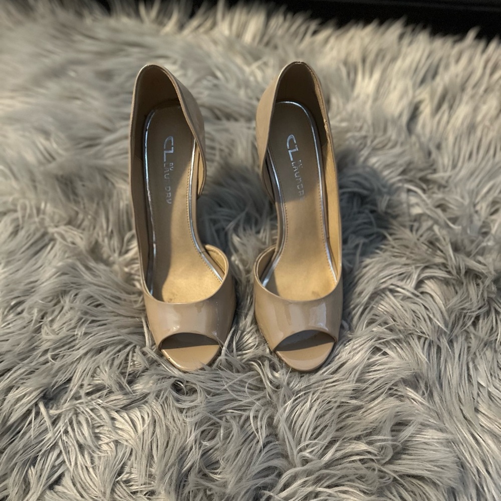Women’s heels . Peep toe Nude